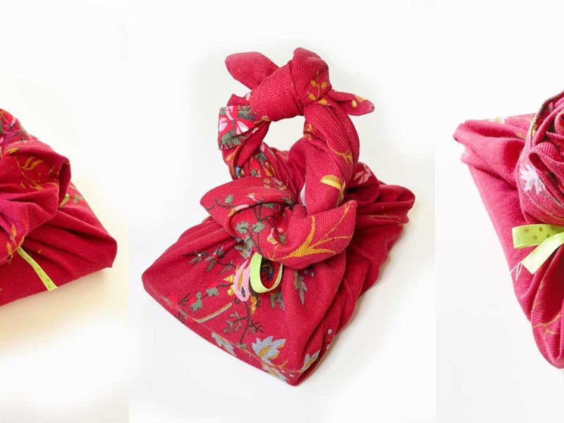 Fabric gift wrapping with handle