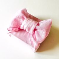Fabric gift wrap with bow