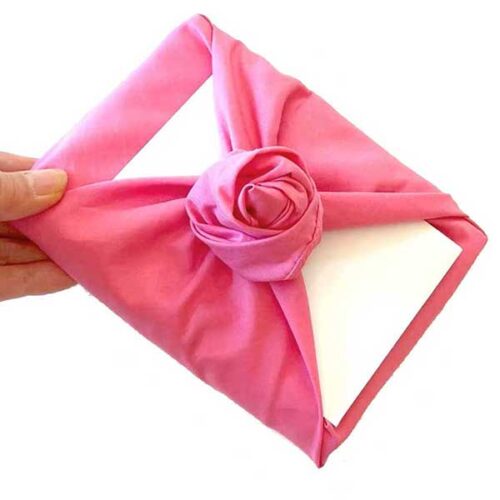 Fabric gift wrapping with rose 